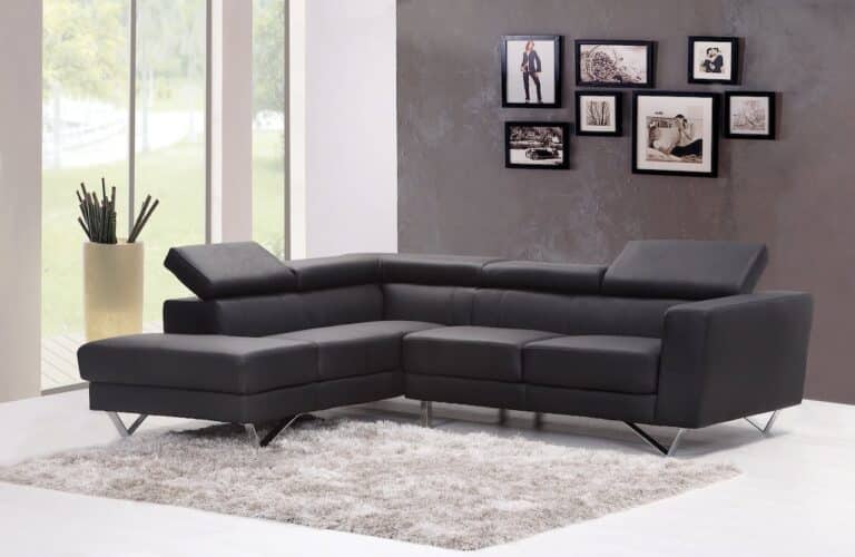 canapé relax électrique en cuir noir avec accoudoirs rembourrés et repose-pieds intégré