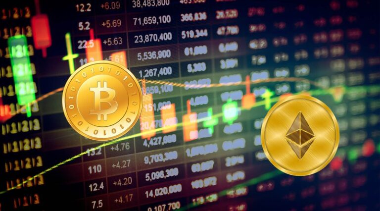 trader analysant des graphiques de crypto-monnaies sur un ordinateur portable